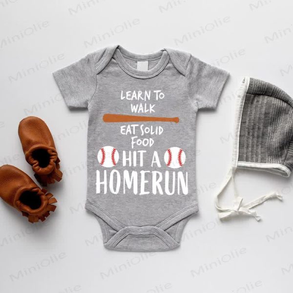 LEARN TO WALK EAT SOLID FOOD HIT A HOMERUN Baby Grey Bodysuit