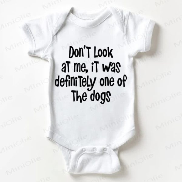 DON'T LOOK AT ME, IT WAS DEFINITELY ONE OF THE DOGS Baby White Bodysuit